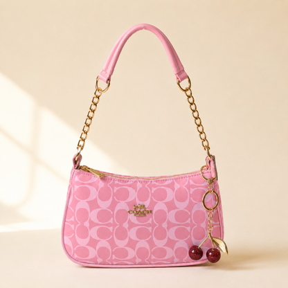 Rosie — Signature Pink Coach Bag with Cherry Charm