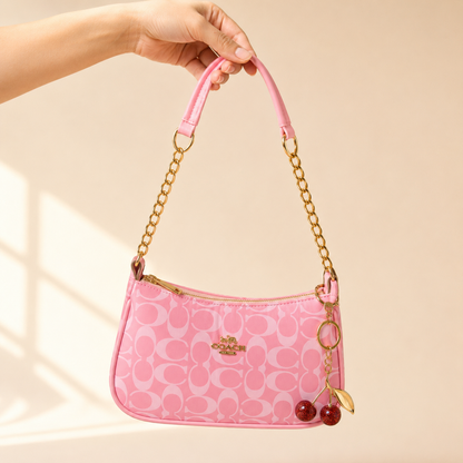Rosie — Signature Pink Coach Bag with Cherry Charm