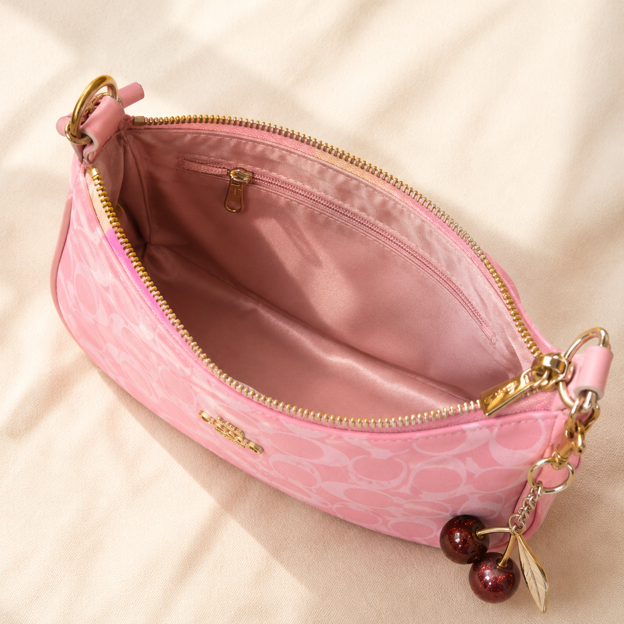 Rosie — Signature Pink Coach Bag with Cherry Charm