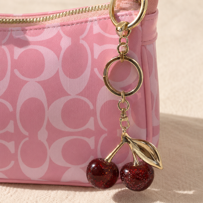 Rosie — Signature Pink Coach Bag with Cherry Charm