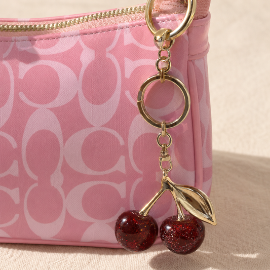 Rosie — Signature Pink Coach Bag with Cherry Charm